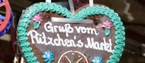 Lebkuchenherz mit Zuckerschrift "Gruß vom Pützchens Markt"